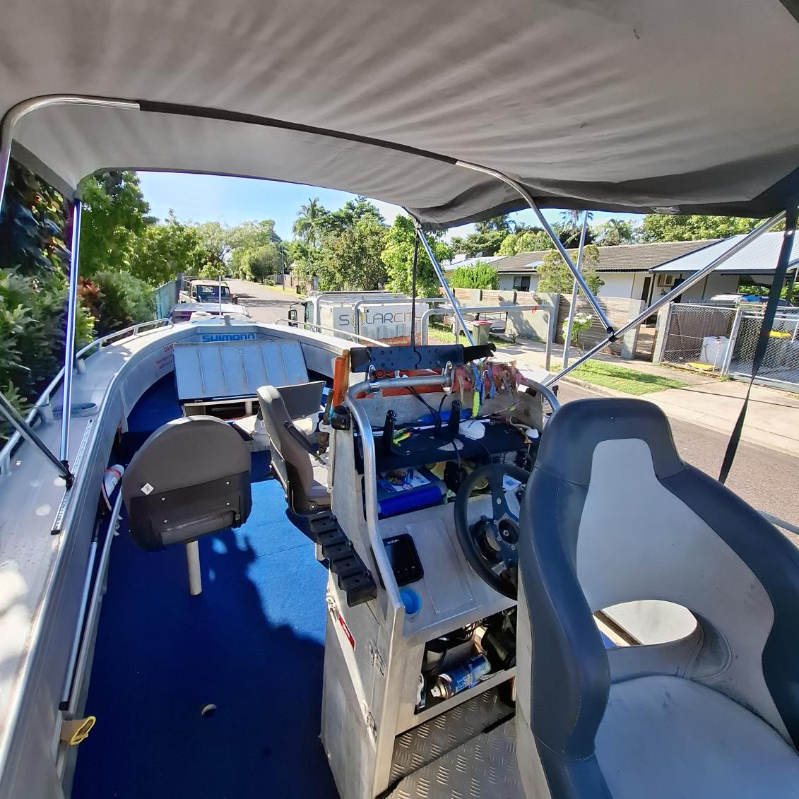 The helm station with sonar screens and swivel seats